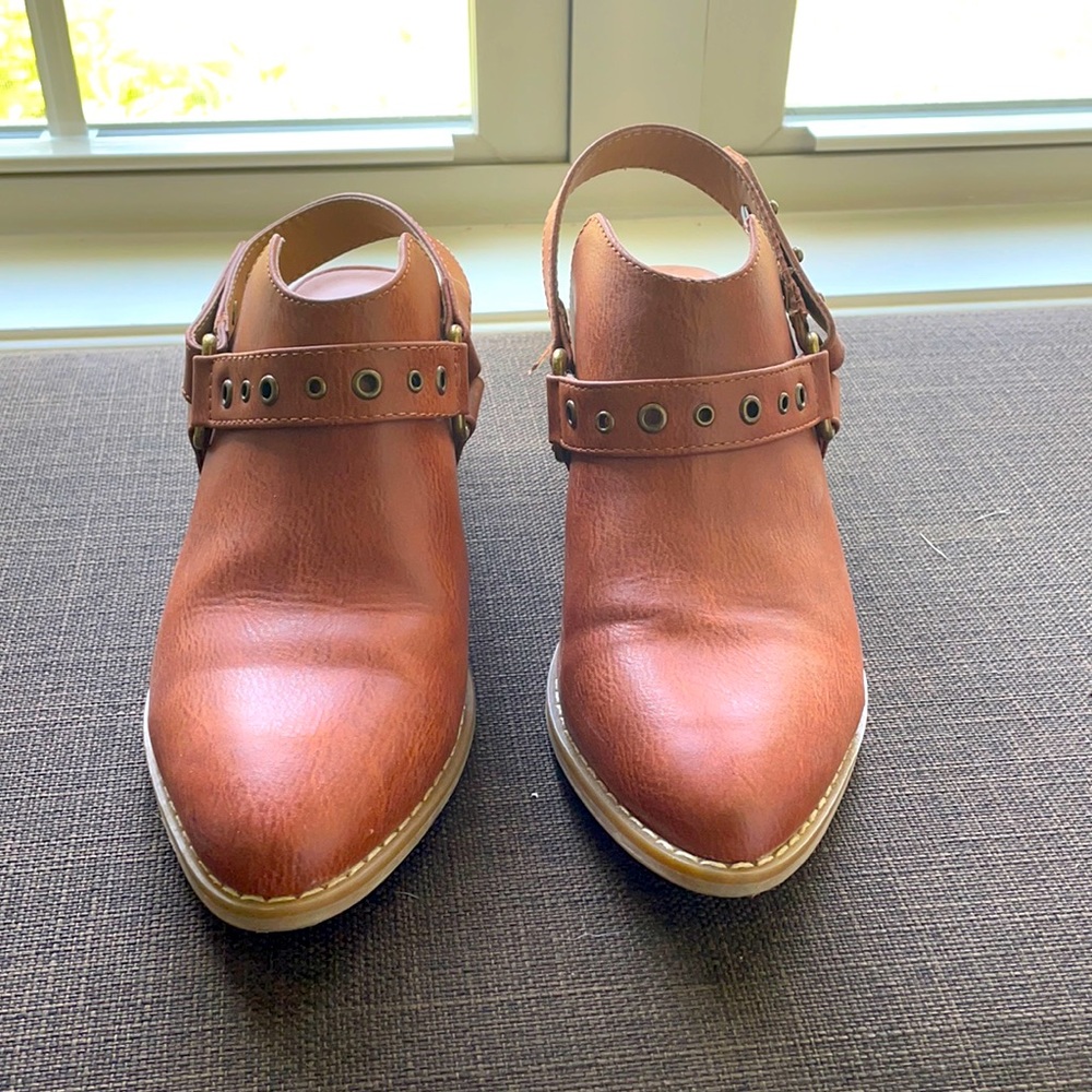 Universal Thread open heeled boots.